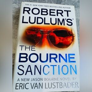 Robert Ludlum’s The Bourne Sanction Hardcover Book by Eric Van Lustbader